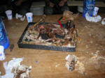 Eating the contents of the sheepskins 